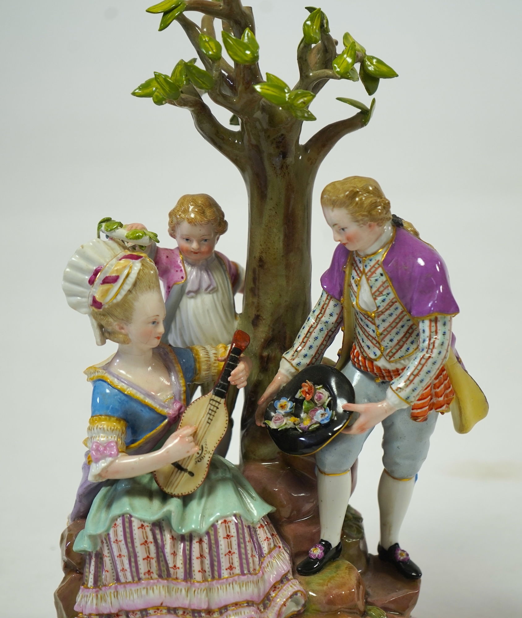 A Meissen porcelain figure group of 'Gardeners' at the Apple Tree', late 19th century